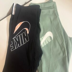 2 pairs of Nike full length leggings